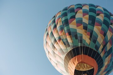 Pastel-colored Hot Air Balloon against Clear Blue Sky - AI Generated
