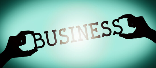 Business - human hands holding black silhouette word