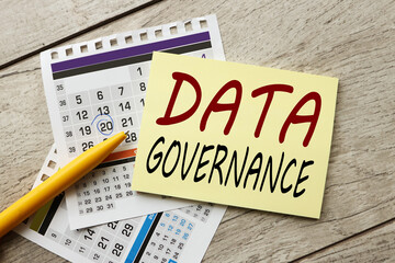 DATA GOVERNANCE text on yellow letterhead on calendar