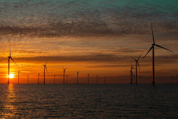 wind turbines at sunset