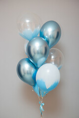 blue and white balloons on a white background