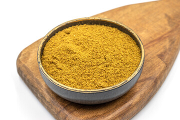 Ground cumin or Jeera Powder. Powder cumin spice in bowl isolated on white background. Dry spice concept. Close up