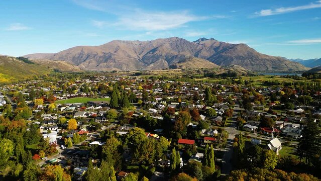 Aerial cinematic view over Arrowtown, New Zealands prime autumn destination