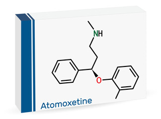 Atomoxetine molecule. It is used in the management of Attention Deficit Hyperactivity Disorder ADHD. Skeletal chemical formula. Paper packaging for drugs.