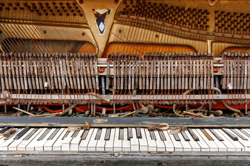 Old piano. Distressed Piano. Old broken piano.