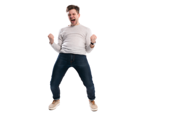 Happy winner. Full length portrait of happy young handsome man gesturing and keeping mouth open while standing against transparent background