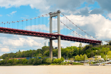 the pont d'Aquitaine is suspension bridge above the river Garonne in Bordeaux France. High quality photography