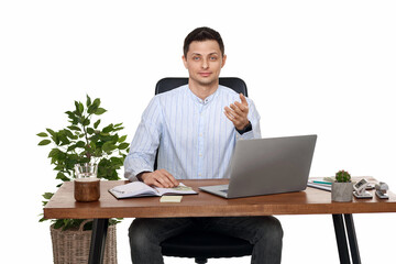 young man using laptop computer for online work at table