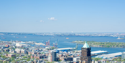 view of the port infrastructure and cargo cranes of new york from a height