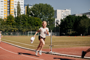 Fototapeta premium Girl runs marathon