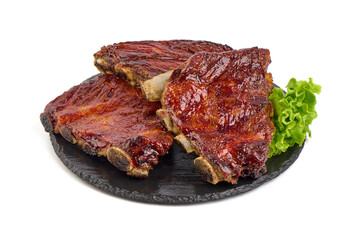 Roasted spicy ribs in a bbq or tomato sauce with herbs, isolated on a white background.