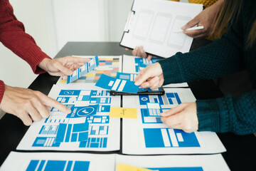 ui designer brainstorming about mobile app interface wireframe design with customer breif and color...