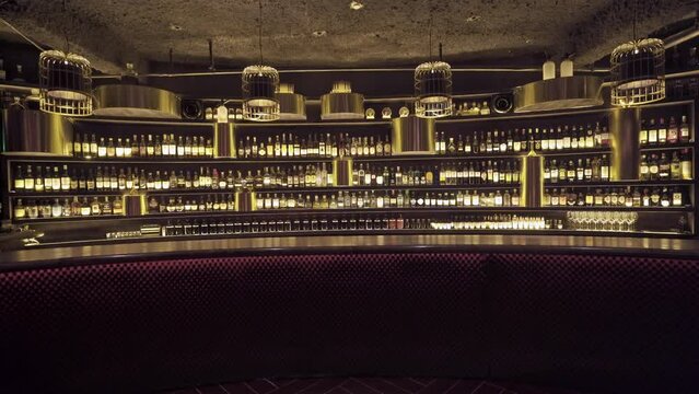 Lights Turning On in Empty Bar Showing Bar Counter in 4K