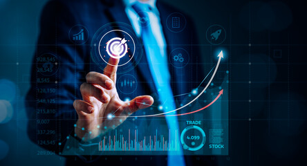 Businessman with Stock Analysis Technology and Strategic Planning with Charts, Diagrams, and Graphs