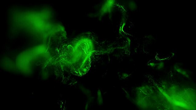 Vibrant green paint or ink fluid spreading on black background