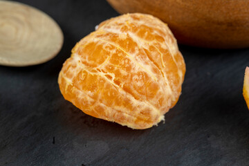 fresh sweet and sour orange on a chopping board