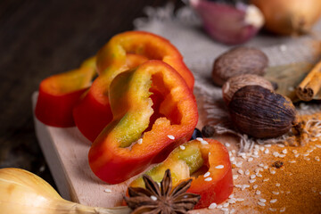 Obraz na płótnie Canvas Sliced into pieces fresh ripe sweet pepper