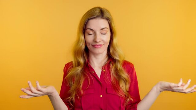 Confusion, shame and young woman spreading hands say oops ouch oh omg i am so sorry. Shy female lady, uncertain emotion with doubt problem, hand gesture with mockup in studio on yellow background