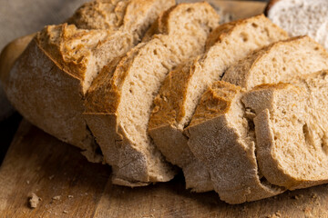 A loaf of bread made of wheat and rye flour cut into pieces