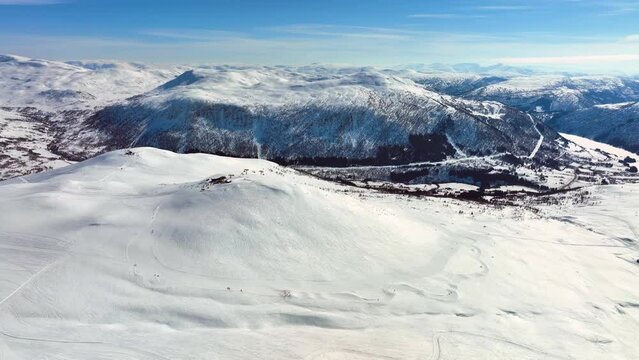 Stunning Myrkdalen valley and skiing center  - Wide angle aerial during sunny day easter vacation