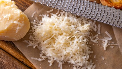 Cheesy Perfection: Close-up of Hand-Grated Parmesan Cheese with Fine Texture