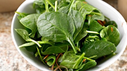 Leafy Goodness: Captivating Close-up of Fresh Spinach Salad, Bursting with Vibrant Flavors