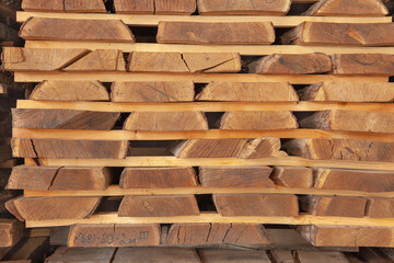 oak board, board texture, boards lie in a warehouse, drying oak boards, production of boards, racks with boards