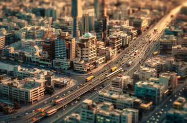 Fototapeta na wymiar a view of a city with some traffic around it