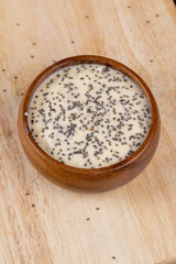 fresh banana-flavored yogurt with banana slices sprinkled with chia seeds