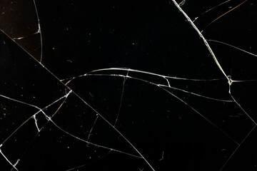 Dirty glass broken into a large number of pieces and parts