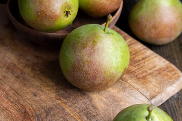 Whole ripe green pears, close up