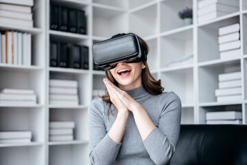 Businesswoman with vr headset lifestyle concept, Businesswoman wearing VR headset to playing game and touching experience virtual reality while relaxation with technology after working