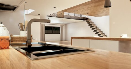 Camera moves around a room, revealing the gradual appearance of furniture and furnishings.