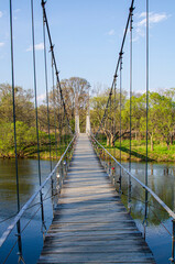 wooden bridge over the river