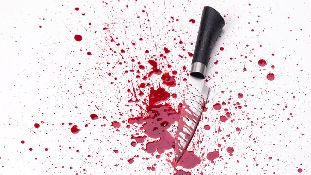 Bloody knife fell on the white floor, which is the concept of violent murder.