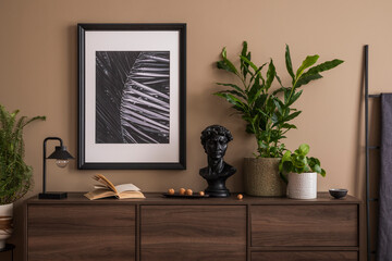 Elegant living room interior with mock up poster frame, wooden sideboard, ladder, plants in flowerpots, stylish sculpture, books, black lamp, plants and personal accessories. Home decor. Template.