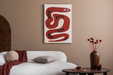 Stylish composition of living room interior with mock up poster frame, boucle sofa, wooden coffee...