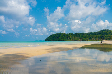 Beautiful sea beach wave white sand blue sky with cloud