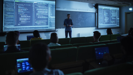 Young Male Teacher Giving a Data Science Lecture to Diverse Multiethnic Group of Female and Male Students in Dark College Room. Projecting Slideshow with Artificial Intelligence Architecture