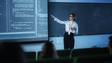 Portrait of a Young University Professor Explaining the Importance of Artificial Intelligence to a Group of Diverse Students. Female Teacher Showing Big Data Ecosystem on a Big Screen - obrazy, fototapety, plakaty