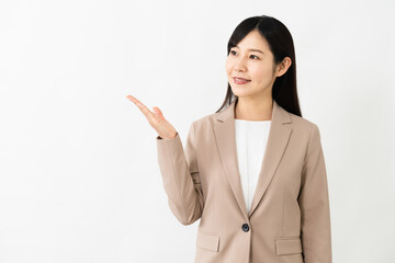 案内をする若い女性　ビジネスイメージ