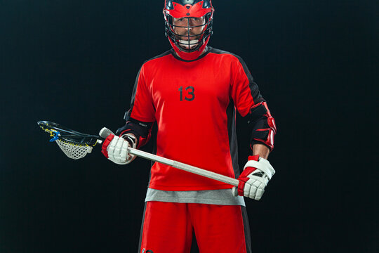 Lacrosse player, athlete. Download photo for sports betting advertisement. Website header. Sports and motivation wallpaper.