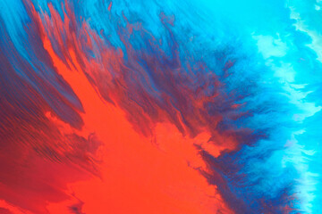 Multicolored creative abstract background. Red blue alcohol ink. Explosion, stains, blots and strokes of paint, marble texture