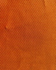 Obraz premium orange leather background orange leather texture orange fabric mesh