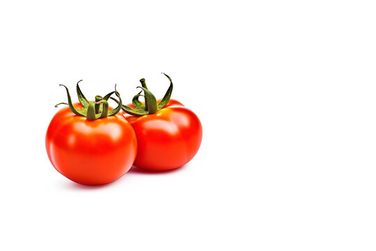 Fresh whole red tomatoes isolated on white background with copy space. Created with Generative AI Technology