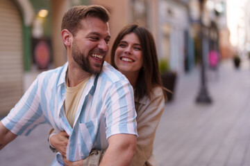 Fototapeta premium Couple enjoying a bicycle ride in the city