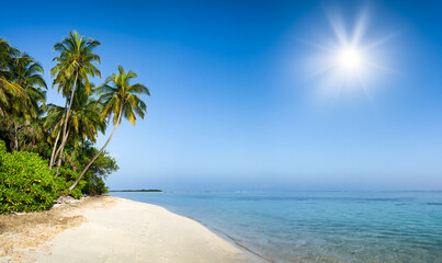 Beautiful beach on a tropical island in the Maldives