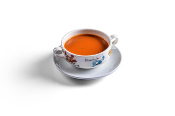 Tomato soup for baby and kids, in bowl with childish pattern