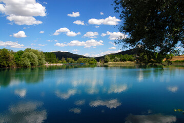clouds reflecting in quiet lake in western Ukraine 