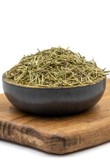 Dried herbs rosemary leaf. Dry seasoning rosemary isolated on white background. Spices and herbs for cooking, provence herbs. Close up